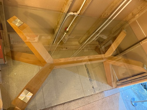 Glass table with oak - legs, and