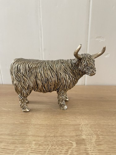 Gold colour highland cow - gold,
