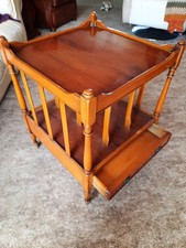 wooden canterbury small table / magazine rack with draw and on castors
