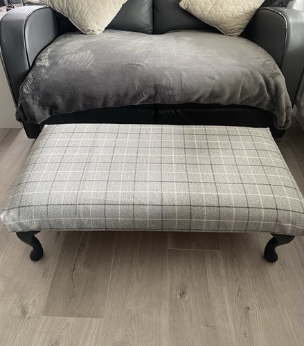 Grey chequered foot stool with - foot,