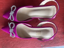 Bright Pink kitten heel ladies shoes with straps and sparkly bow detail