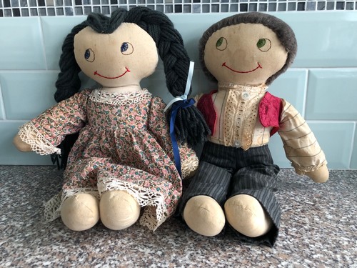 Two vintage dressed - two,