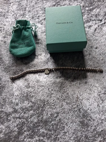 Tiffany silver beaded - &,