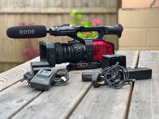 Panasonic AG-DVX 200 4K camcorder.  Excellent, low hours. Rode mic, 5 batteries 