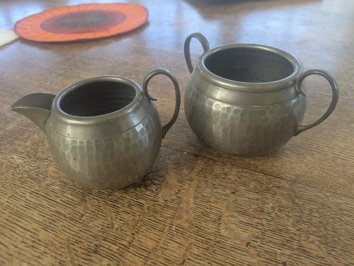 Hand beaten pewter jug and - hand,