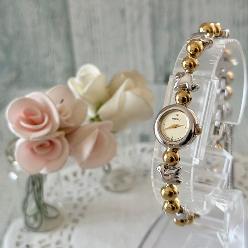 Seiko gold dove motif quartz - motif,