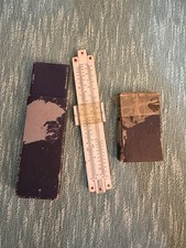 vintage slide rule with its
