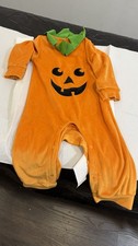 baby's pumpkin-themed