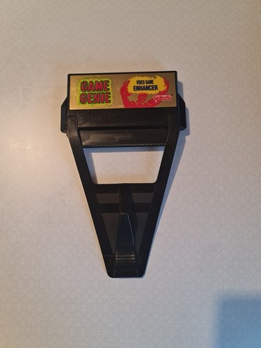 Galoob game genie - game,