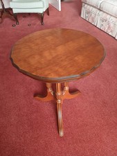 Circular wooden coffee table