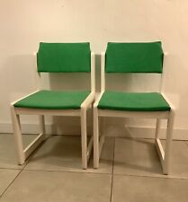 A Pair Of White Mid Century German Dining Chairs With Green Reupholstery