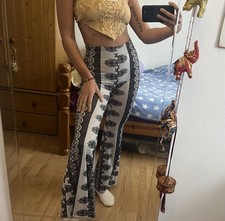 ASOS hippy 60s 70s festival style flared trousers   - Small