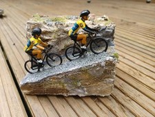 1 cyclist miniature Riding
