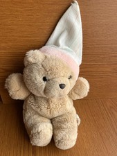 soft toy plush bedtime bear wearing a nightcap, has cavity in his back