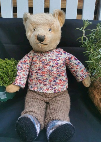 Hand knitted teddy bear