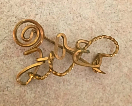 Gold tone abstract swirl metal - gold,