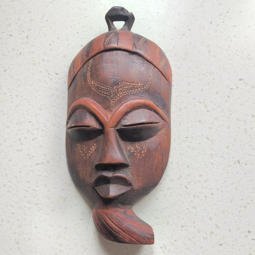 Hand carved wooden face - carved,