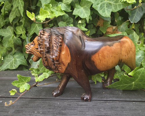 Hand carved wooden - hand, lion