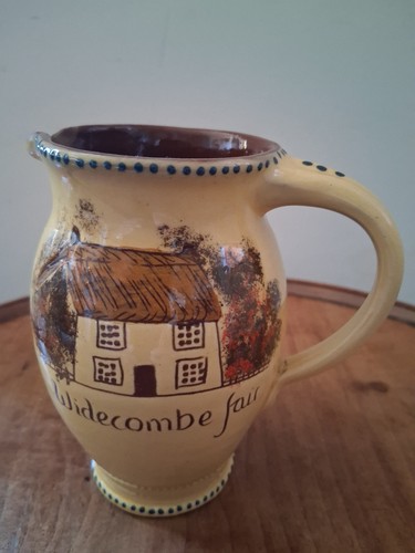 Hand made pottery milk - hand, jug