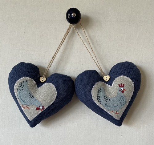 Pair heart door hangers - of,