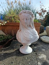 Stone garden bust of lady in