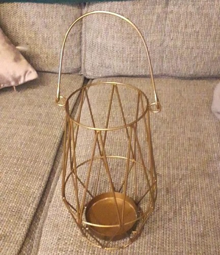 Goldtoned metalic candle - metalic,