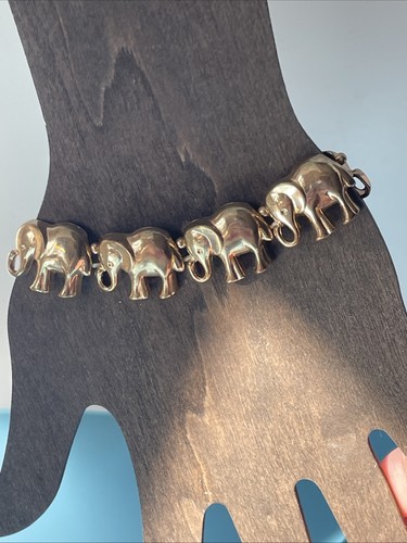 Gold tone elephant - gold,