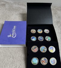 The Official Peter Pan Commemorative Collection. 12 Colourful Medals In Box.