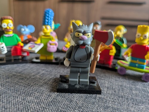 Lego scratchy minifig with axe - scratchy,