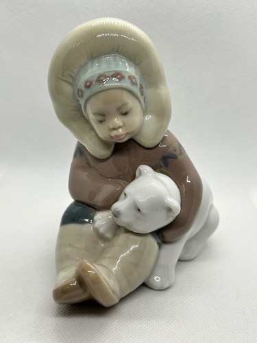Lladro eskimo playing inuit - eskimo,