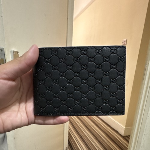 Gucci black leather bifold - gucci,