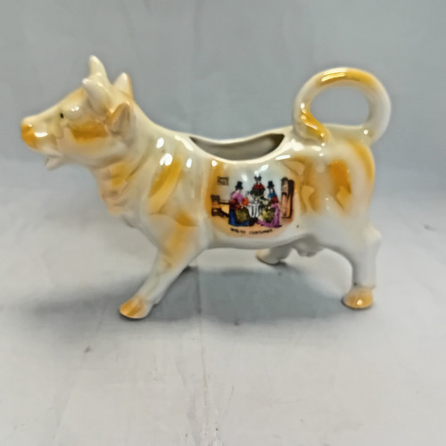 Vintage cow creamer jug with