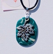 Teal marble oval handmade polymer clay pendant with leaf charm & waxed cord