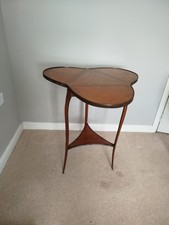 A 19th C. Clover Shape Drop Leaf Table with Parquetry inlay on three scroll legs