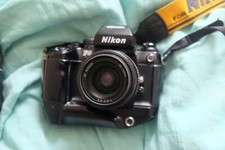 Nikon F4S with battery grip , NIKKOR 35-70mm F/3.3-4.5 Lens, and 70-210 lens