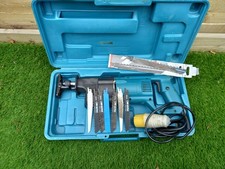 unbranded 110v reciprocating saw very good condition in box with spare blades