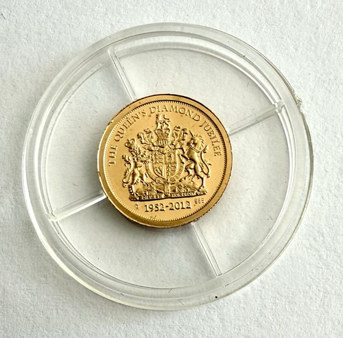 Solid gold coin qe ii - solid,