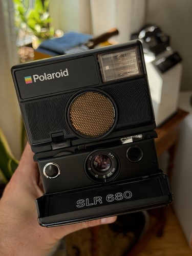 Polaroid slr 680 refurbished - polaroid,