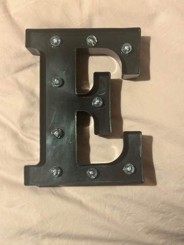Black letter light - e, up