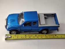 MITSUBISHI L200 PICKUP TRUCK WITH MINI ON TRAILER DIECAST MODEL