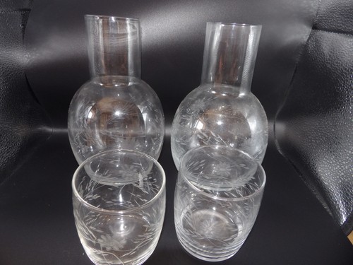 Pair clear glass tumble - of,