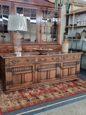 Carved Oak Dresser Base In The Style Of Titchmarsh And Goodwin 