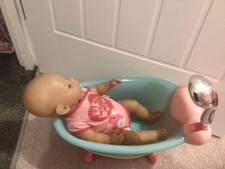 baby born doll and working baby born bath/shower