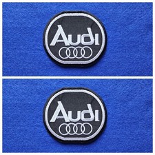 A Pair Of Motor Car Racing