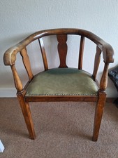 Curved wooded chair with