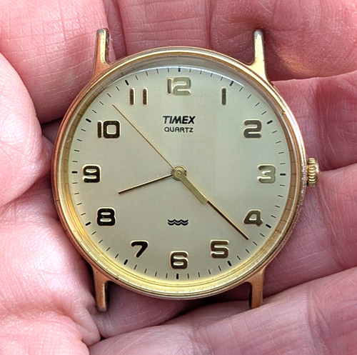 1989 timex quartz - gold, tone