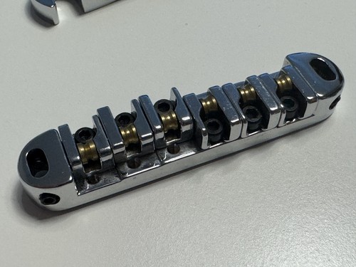 Roller saddle bridge - roller, for