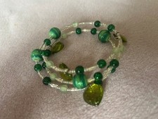 Green and clear seed memory wire bracelet