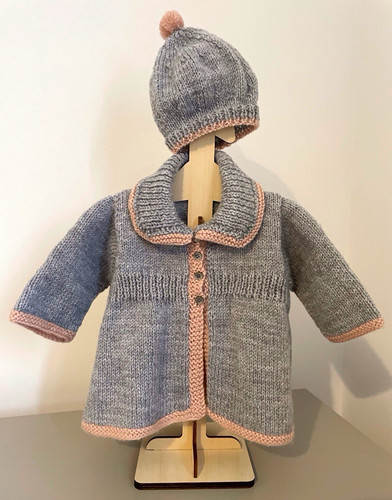 Hand knitted grey pink - hand,