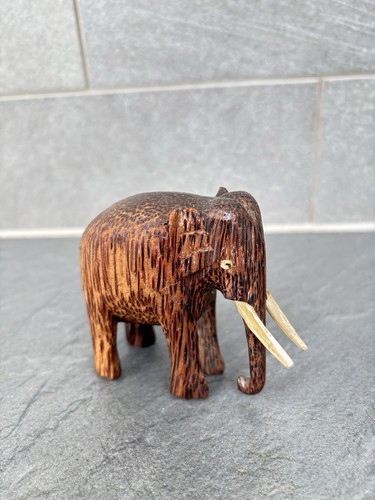 Charming hand carved coconut - carved,